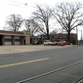 View from north end of fire station towards boarding house