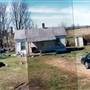 shack w/farm in background